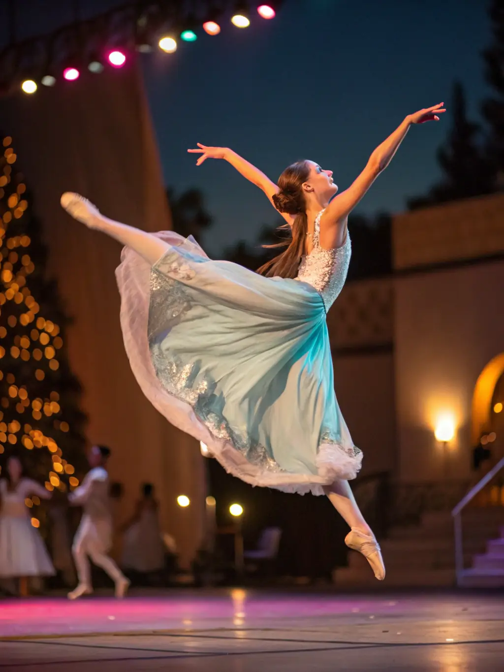A photograph of a dance performance at TANDEM, showcasing dancers in motion with dynamic lighting and expressive movements.